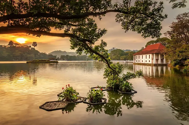 Kandy Lake ringed by its walled parapet and wooded hills