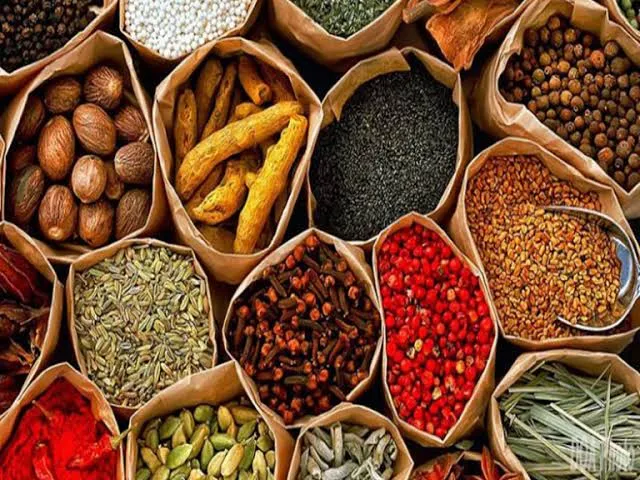 Spices and dried goods at a Kandy market stall