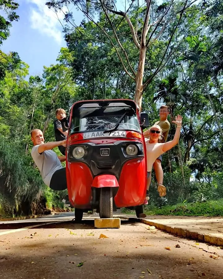 Three-wheeler tuk tuk on a Kandy street